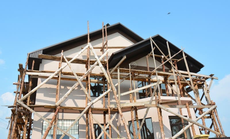 Exterior painting work with scaffolding